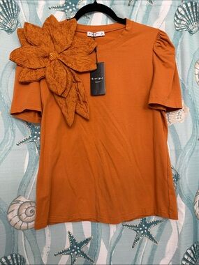 Everly Orange Short Sleeve Tee with Statement Flower